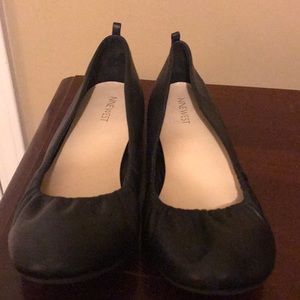 Black Nine West flats.
